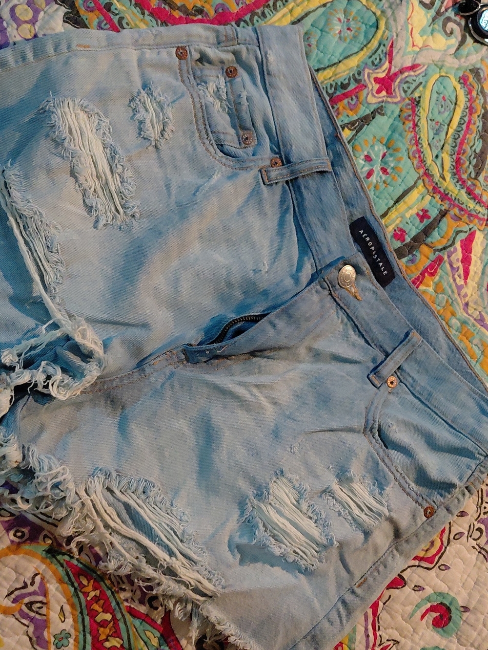 Women's distressed denim shorts